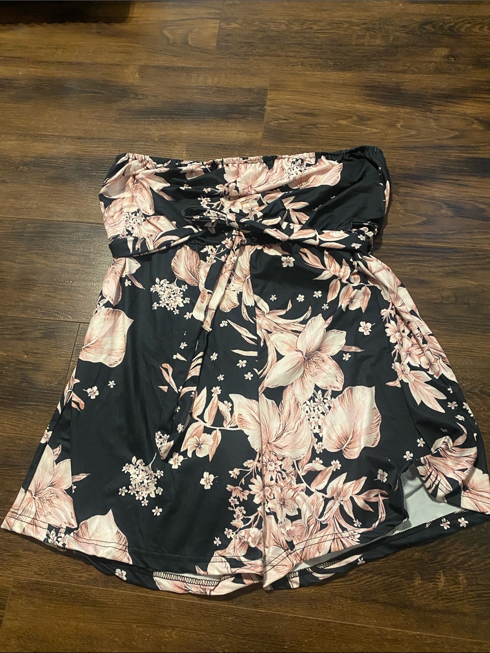 Black romper with floral details